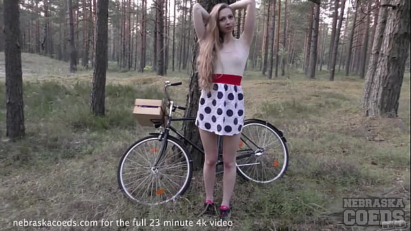 skinny areana fox riding a bicycle nude outdoors in a forest and masturbating